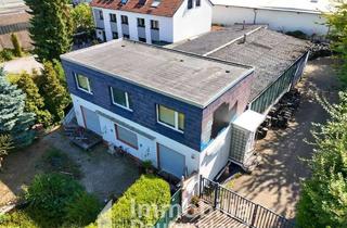 Gewerbeimmobilie kaufen in 44149 Dorstfeld, Flexibles Nutzungskonzept: Gewerbeimmobilie mit Halle, Werkstatt, Garagen & integrierter Wohnfläche