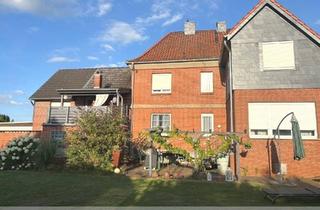 Haus kaufen in 31275 Lehrte, Lehrte - Immensen: Solides 2-Familienhaus mit bezauberndem Garten und Doppelcarport
