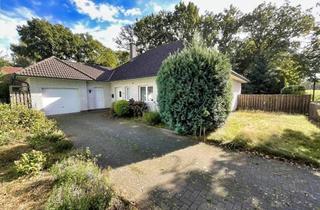Haus kaufen in 49696 Molbergen, Charmanter Bungalow mit Garage und viel Garten im Herzen von Molbergen!
