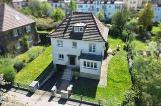 Einfamilienhaus kaufen in 70563 Stuttgart, Stuttgart - Freistehendes Einfamilienhaus mit Garten und Garage in sehr ruhiger und bevorzugter Wohnlage!