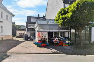 Haus kaufen in 61267 Neu-Anspach, Ein Haus, viele Perspektiven | EFH mit Gewerbefläche in Neu-Anspach