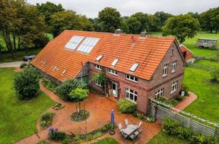 Haus kaufen in 26629 Großefehn, Modernisierter Resthof mit rund 2,1 Hektar warten auf Naturliebhaber und Tierfreunde