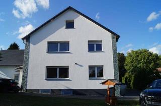 Haus kaufen in Flurstrasse 59, 32791 Lage, Zweifamilienhaus mit Anbau und Carport in Lage