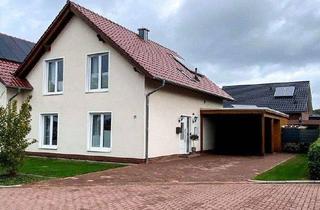 Doppelhaushälfte kaufen in 49696 Molbergen, Molbergen - Doppelhaushälfte mit Terrasse, Carport und Gerätehaus in Molbergen