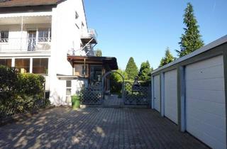 Haus kaufen in 93105 Tegernheim, Tegernheim - Haus mit 3 Wohnungen und 4 Garagen zu verkaufen!