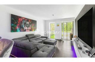 Wohnung kaufen in 79588 Efringen-Kirchen, Moderne Erdgeschosswohnung mit Terrasse und Gartenanteil in gepflegter Wohnanlage