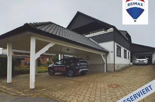 Einfamilienhaus kaufen in 32609 Hüllhorst, Raum für die ganze Familie – Leben in ruhiger Lage mit zusätzlicher Wohneinheit