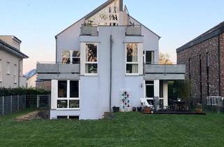 Wohnung kaufen in 50374 Erftstadt, Erftstadt - Wunderschöne Maisonette-Wohnung mit Garten Haus-Charakter