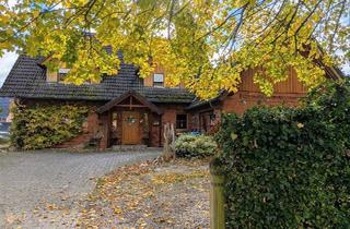 Einfamilienhaus kaufen in 27412 Tarmstedt, Tarmstedt - Einfamilienhaus mit Garage und großen Grundstück