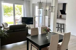 Wohnung kaufen in 33129 Delbrück, Delbrück - Barrierefreie Erdgeschosswohnung mit Garten im Neubaugebiet