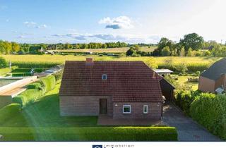 Haus kaufen in 26624 Südbrookmerland, Landhaus mit Weitblick – Wohnen im Grünen mit viel Potenzial
