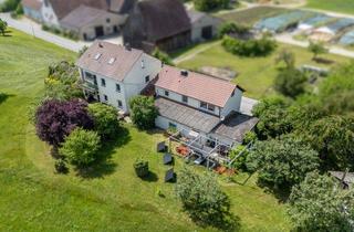 Haus kaufen in 91448 Emskirchen, Attraktive Kapitalanlage: Zwei vermietete Häuser in ruhiger Ortsrandlage