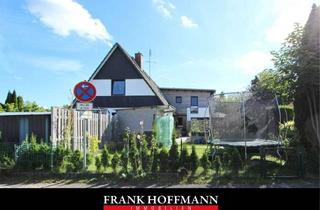 Haus kaufen in 25355 Barmstedt, Kapitalanlage in Barmstedt - Vermietetes Zweifamilienhaus mit Wärmepumpe und neuen Fenstern