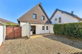 Einfamilienhaus kaufen in 52372 Kreuzau, Freistehendes Einfamilienhaus mit Garage und großem Potenzial in Kreuzau-Stockheim