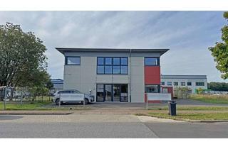 Gewerbeimmobilie kaufen in 46562 Voerde, Repräsentative Gewerbeimmobilie in Voerde-Holthausen mit großzügiger Verkaufsfläche, Büros und Stell