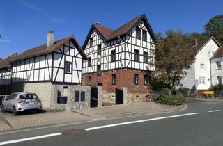Einfamilienhaus kaufen in 35633 Lahnau, Modernisiertes Einfamilienhaus mit ausbaubarer Bürofläche.