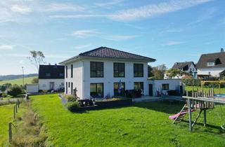 Einfamilienhaus kaufen in 53949 Dahlem, Modernes Einfamilienhaus mit großzügigem Raumkonzept, Fernblick und energieeffizienter Haustechnik.