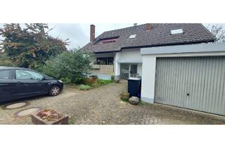 Wohnung kaufen in Wuhrmatten, 79353 Bahlingen, Charmante 2,5-Zimmer Souterrainwohnung 78m² mit Terrasse in Bahlingen am Kaiserstuhl