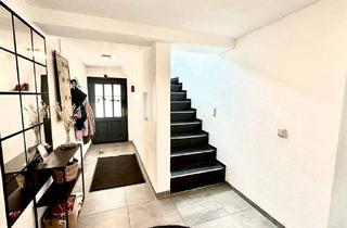 Einfamilienhaus kaufen in 56459 Gemünden, Gemünden - Familienfreundliches Haus mit 6 Zimmern, Garage und Terrasse