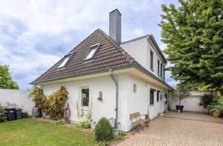Einfamilienhaus kaufen in 28879 Grasberg, Grasberg - Modernes Wohnen mit dem gewissen Etwas - Großzügiges Einfamilienhaus mit Blick ins Grüne