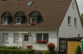 Reihenhaus kaufen in 34253 Lohfelden, Lohfelden - Reihenendhaus mit Garten und Garage