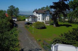 Villa kaufen in 26434 Wangerland, WIRFINANZ: Traumhafte Villa mit drei Ferienwohnungen direkt am Wangermeer