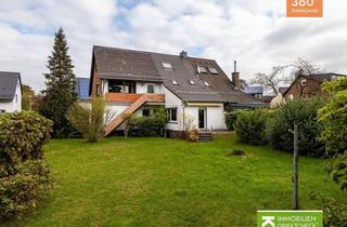 Doppelhaushälfte kaufen in 40880 Ratingen, Familienparadies: Große Doppelhaushälfte mit Garage und viel Platz im Garten