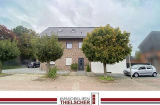 Doppelhaushälfte kaufen in 52511 Geilenkirchen, Attraktives Zweifamilienhaus mit angrenzender Doppelhaushälfte, Stellplatz und zwei Garagen