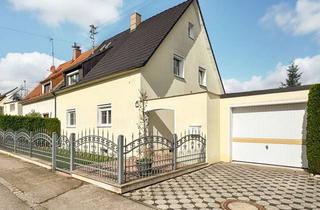 Haus kaufen in 86316 Friedberg, Gepflegtes Zweifamilienhaus mit 2 Garagen und großem Garten