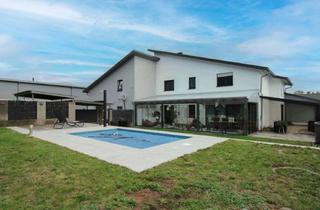 Einfamilienhaus kaufen in 66882 Hütschenhausen, Modernes Wohnen trifft Arbeiten unter einem Dach – Exklusives Einfamilienhaus mit Gewerbeeinheit