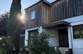 Haus kaufen in 55268 Nieder-Olm, Freistehendes, vielseitig nutzbares Zweifamilienhaus mit großem Garten