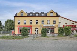 Anlageobjekt in Bahnhofstr. 67, 14612 Falkensee, Mehrfamilienhaus mit attraktiver Mischung aus Wohnen, Gewerbe und Stellplätzen in Falkensee