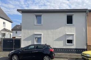 Anlageobjekt in 63329 Egelsbach, Vermietetes, saniertes 2-Familienhaus in Egelsbach