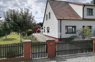 Doppelhaushälfte kaufen in 16244 Schorfheide, Haus mit Doppelgarage und schönem Garten