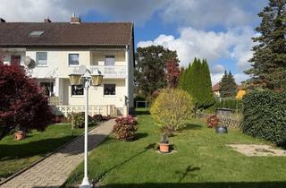 Haus kaufen in 31180 Giesen, Charmantes Reihenendhaus mit Garten, Garage und Carport in der Gemeinde Giesen