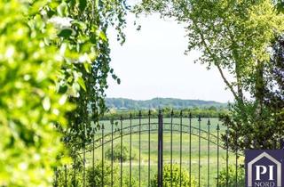 Haus kaufen in 24582 Brügge, Magisches Wohnen im Einklang mit der Natur – preisgekröntes Architektenhaus inmitten des "glückl...
