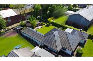 Haus kaufen in 25795 Weddingstedt, Großzügiger Winkelbungalow in ruhiger Wohnlage mit Ausbaureserve und gepflegtem Garten