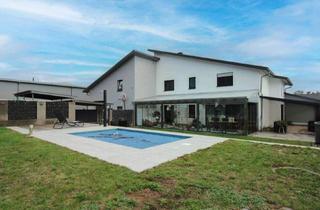 Einfamilienhaus kaufen in 66882 Hütschenhausen, Hütschenhausen - Modernes Wohnen trifft Arbeiten unter einem Dach - Exklusives Einfamilienhaus mit Gewerbeeinheit