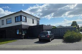 Doppelhaushälfte kaufen in 49828 Neuenhaus, Neuenhaus - Doppelhaushälfte mit Garage und Garten