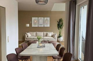 Wohnung kaufen in 60437 Nieder-Erlenbach, Zwei-Zimmer-Dachgeschosswohnung mit Weitblick und Westbalkon