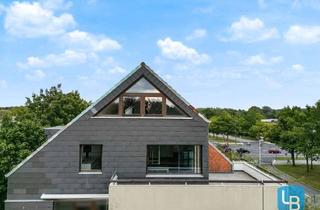 Wohnung kaufen in 24107 Suchsdorf, Für Individualisten! Lichtdurchflutete Architektur im Dachgeschoss mit exklusiver Ausstattung