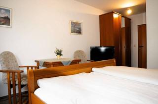 Wohnung kaufen in 49214 Bad Rothenfelde, Top-Investment: Café, Apartments & TG-Stellplatz - Teil- oder Gesamtkauf möglich!