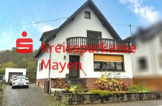 Einfamilienhaus kaufen in 56645 Nickenich, Charmantes Einfamilienhaus mit Garage, Garten und Nebengebäuden