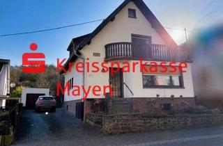 Einfamilienhaus kaufen in 56645 Nickenich, Charmantes Einfamilienhaus mit Garage, Garten und Nebengebäuden
