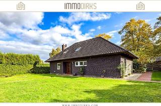 Haus kaufen in 26789 Leer, Bingum: Attraktiver Bungalow mit 2 Kaminen, Sonnenterrasse & großem Garten
