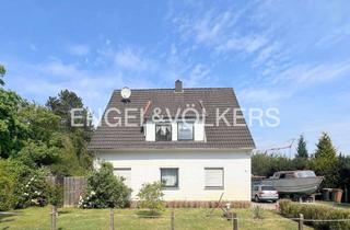 Haus kaufen in 26419 Schortens, Solides Haus mit großem Grundstück