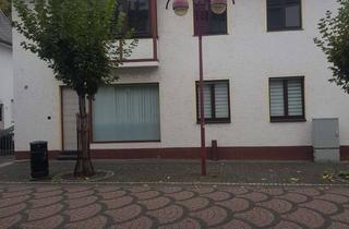 Mehrfamilienhaus kaufen in Hauptstraße 77, 53557 Bad Hönningen, Geräumiges Mehrfamilienhaus in der Bad Hönninger Fußgängerzone mit Garten und 4 Stellplätzen