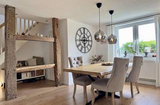 Wohnung kaufen in Aulflucht, 59514 Welver, Modernisierte Eigentumswohnung auf zwei Etagen — mit Garten, zwei Stellplätzen und Einbauküche