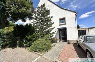 Doppelhaushälfte kaufen in 59174 Kamen, Kamen-Süd: Charmante Doppelhaushälfte auf 567 m² großem Grundstück mit Garage und kl. Winterga