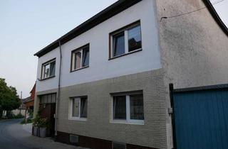 Haus kaufen in Franz-Ellerbrock-Straße 11, 53501 Grafschaft, 4,5 Zimmer, romantischer Innenhof und Garage